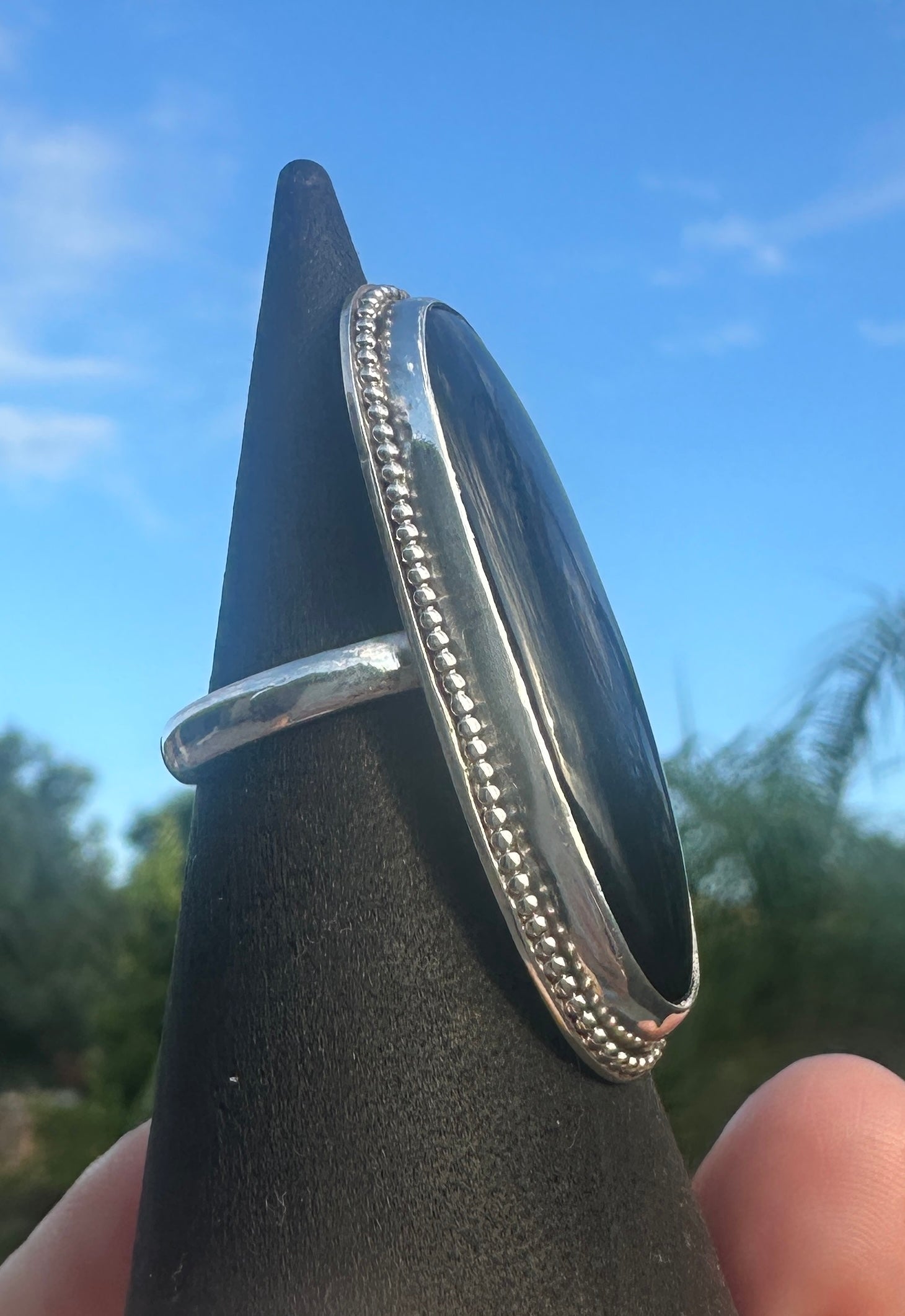 An extra large onyx ring