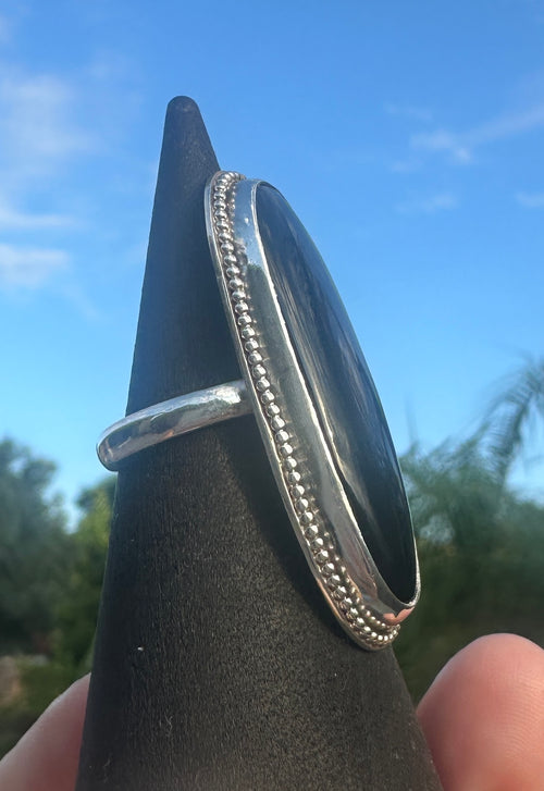 An extra large onyx ring